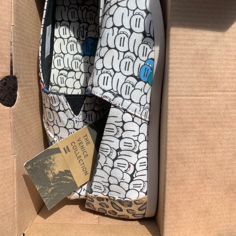 Women’s classic Tom’s in size 8.5. Multi-color